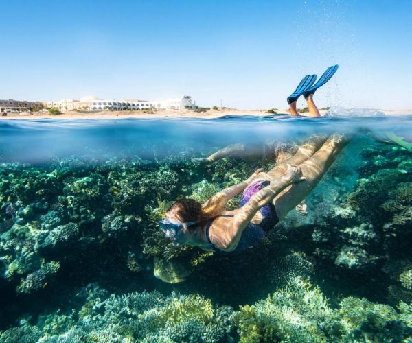 Three Corners Equinox Beach Resort in Marsa Alam aan het koraal duiken tussen de vissen